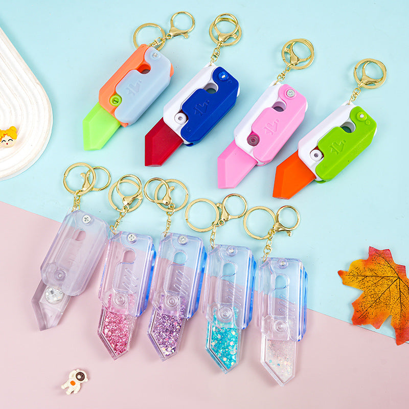 Wholesale Cartoon Quicksand Acrylic Radish Knife Decompression Toy Keychain