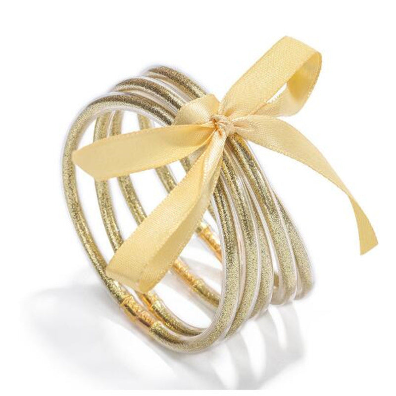 Wholesale Multi-layer silicone rainbow glitter bow bracelet