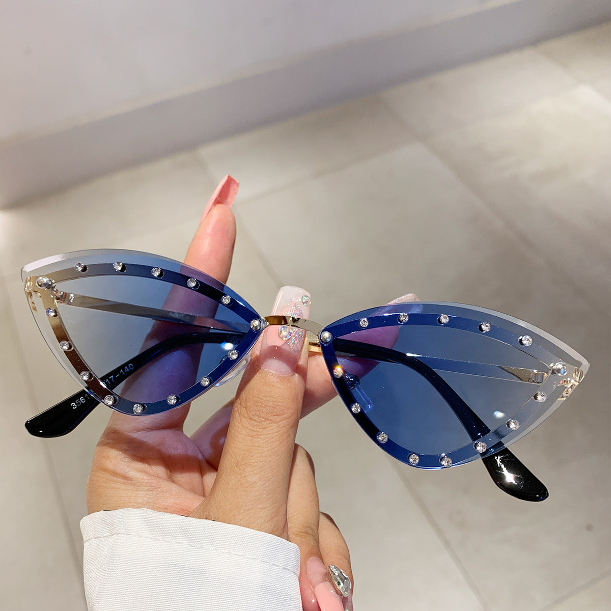 Wholesale Colorful rimless diamond cat-eye sunglasses