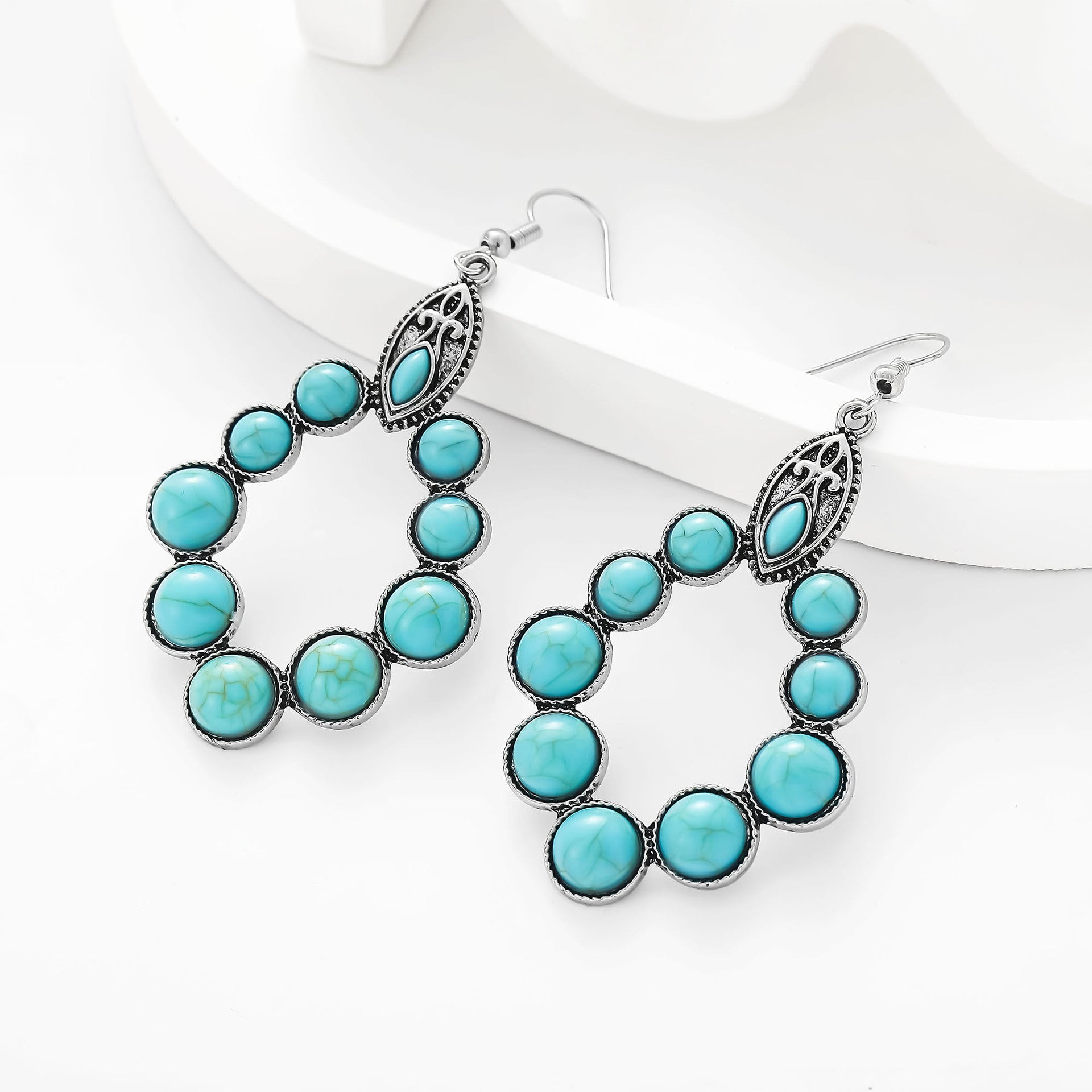 Wholesale Vintage Bohemian Turquoise Drop Shape Hollow Earrings
