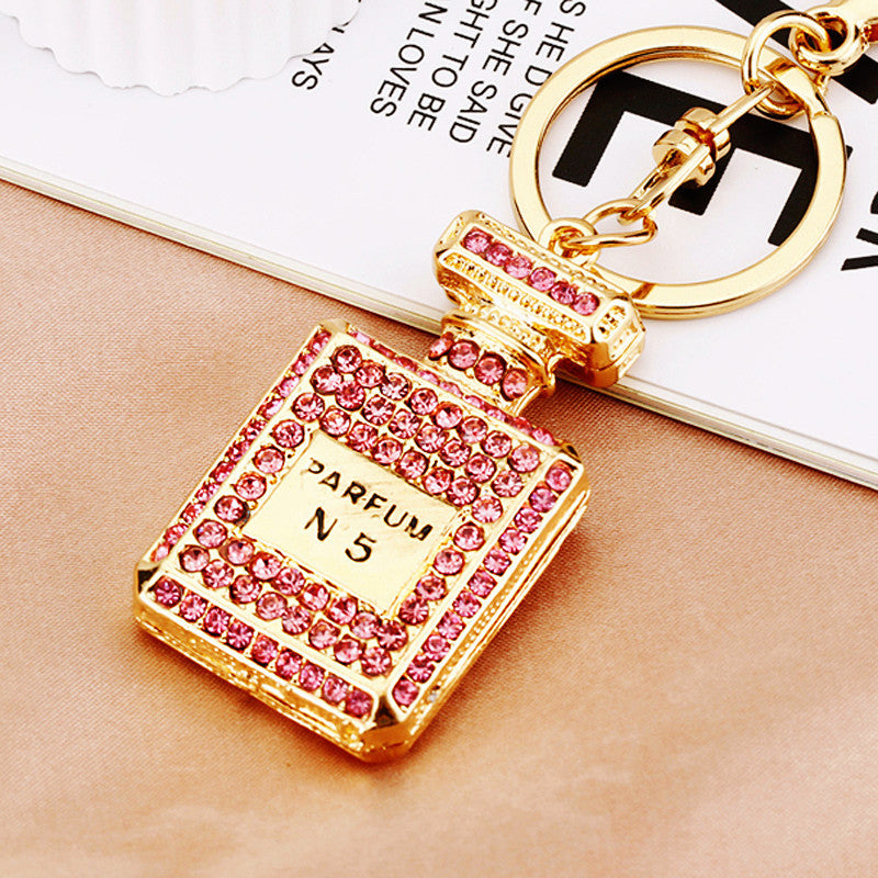 Wholesale Pearl Perfume Bottle Bow Rhinestone Keychain Bag Charm Chic Fashion Accessory Boutique Gift