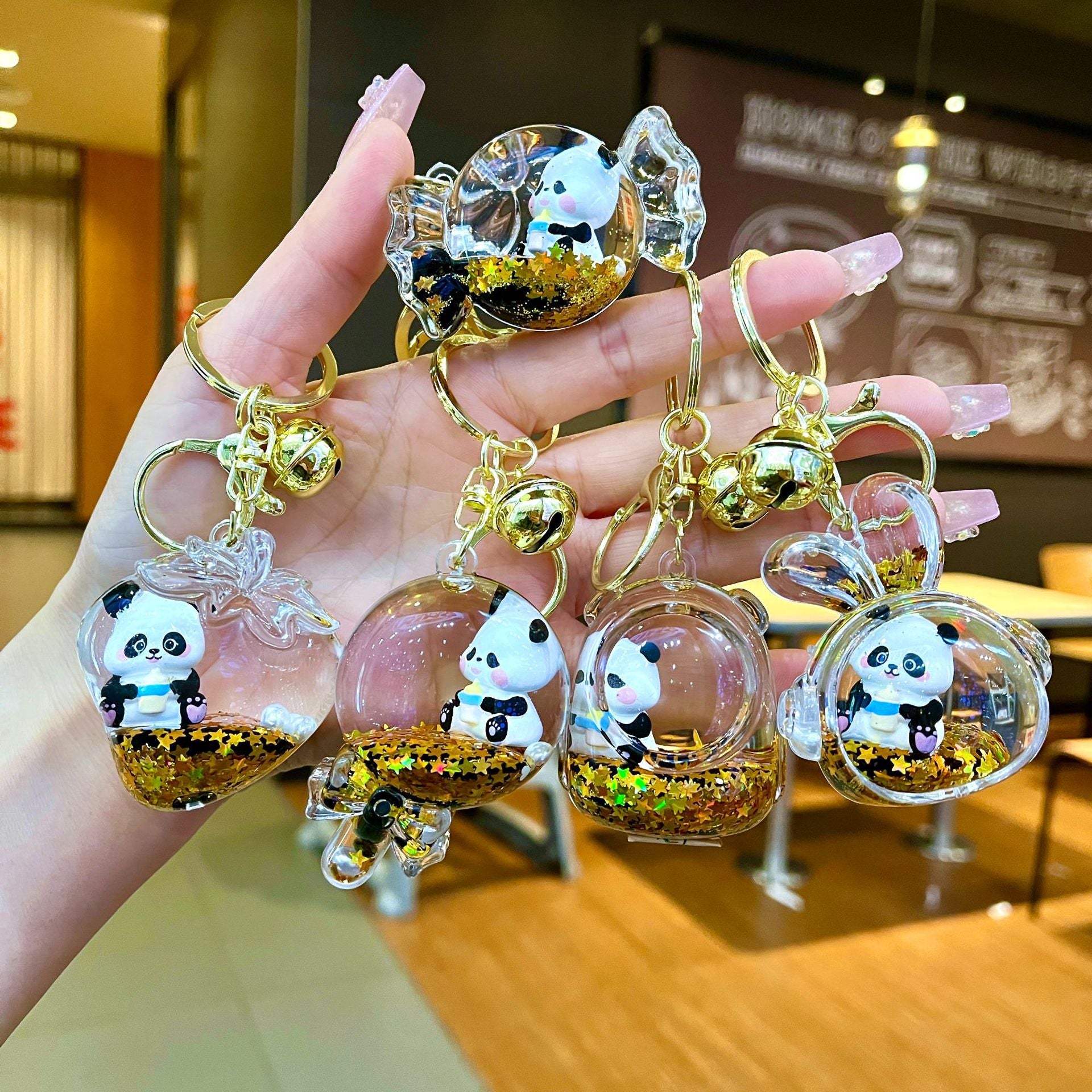 Wholesale Black gold floating cartoon cute panda Liquid Keychains