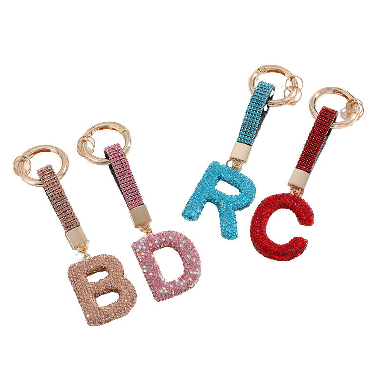 Wholesale Pottery Clay Water Diamond Alloy Dot Diamond Letter Keychain