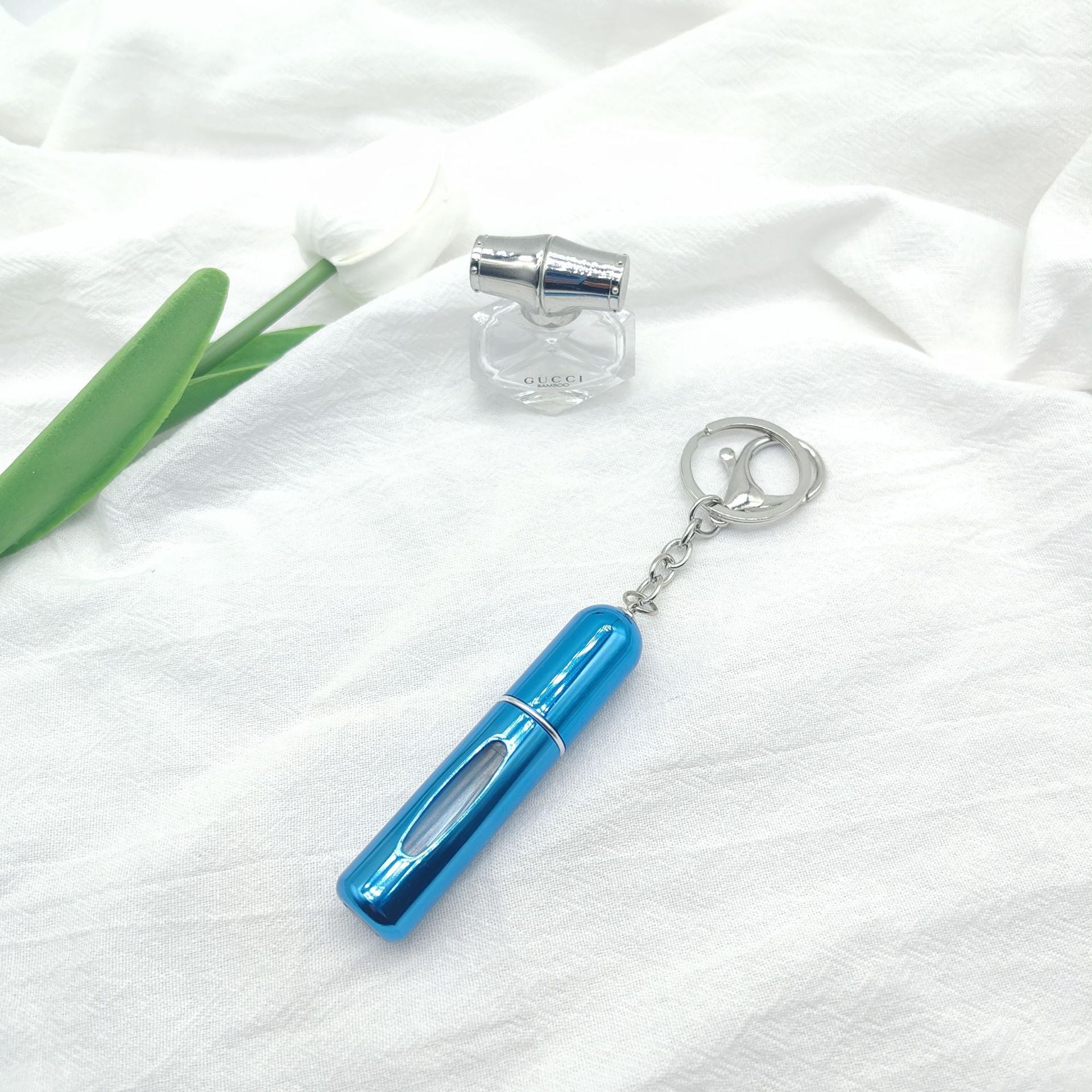 Wholesale bottom filling pump 5ml high color value sample key chain perfume bottle