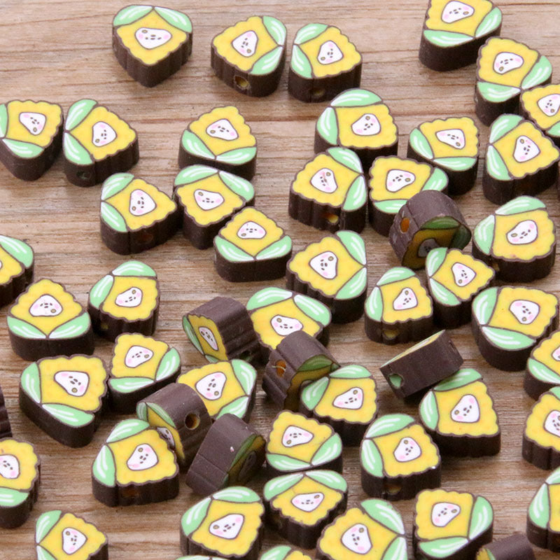 Al por mayor 20 piezas de cerámica suave de cerámica perforada de la fruta animal cuentas del corazón