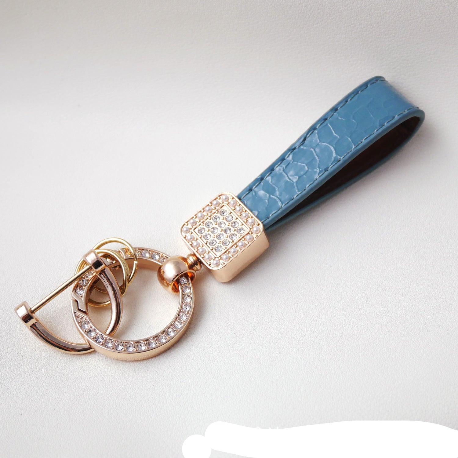 Wholesale Fashionable textured diamond spring ring keychain