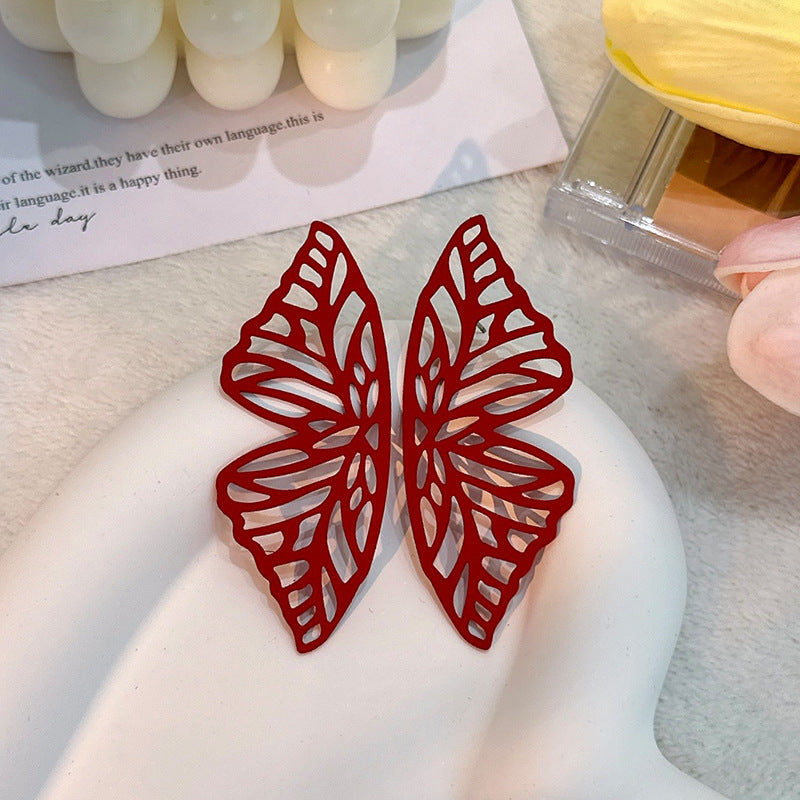Wholesale Hollow Out Butterfly Solid Color Earrings