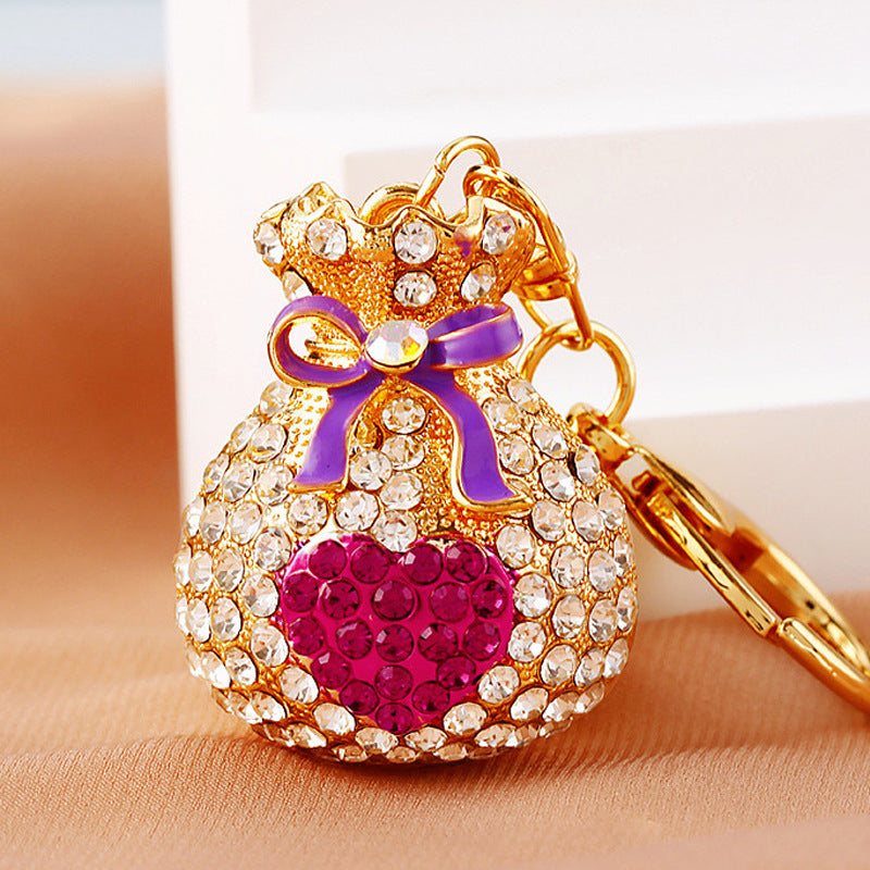 Wholesale Metal Pearl Heart Lucky Bag Keychain Cute Car Key Accessory Bag Charm For Women Gift