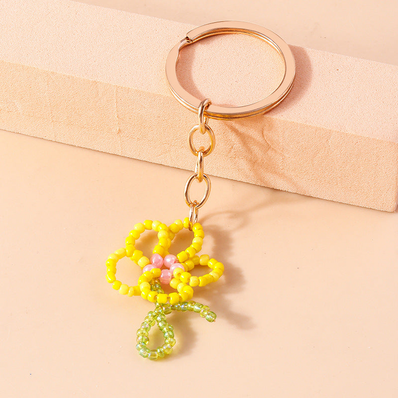 Wholesale Rice Pearl Flower Pendant Keychain