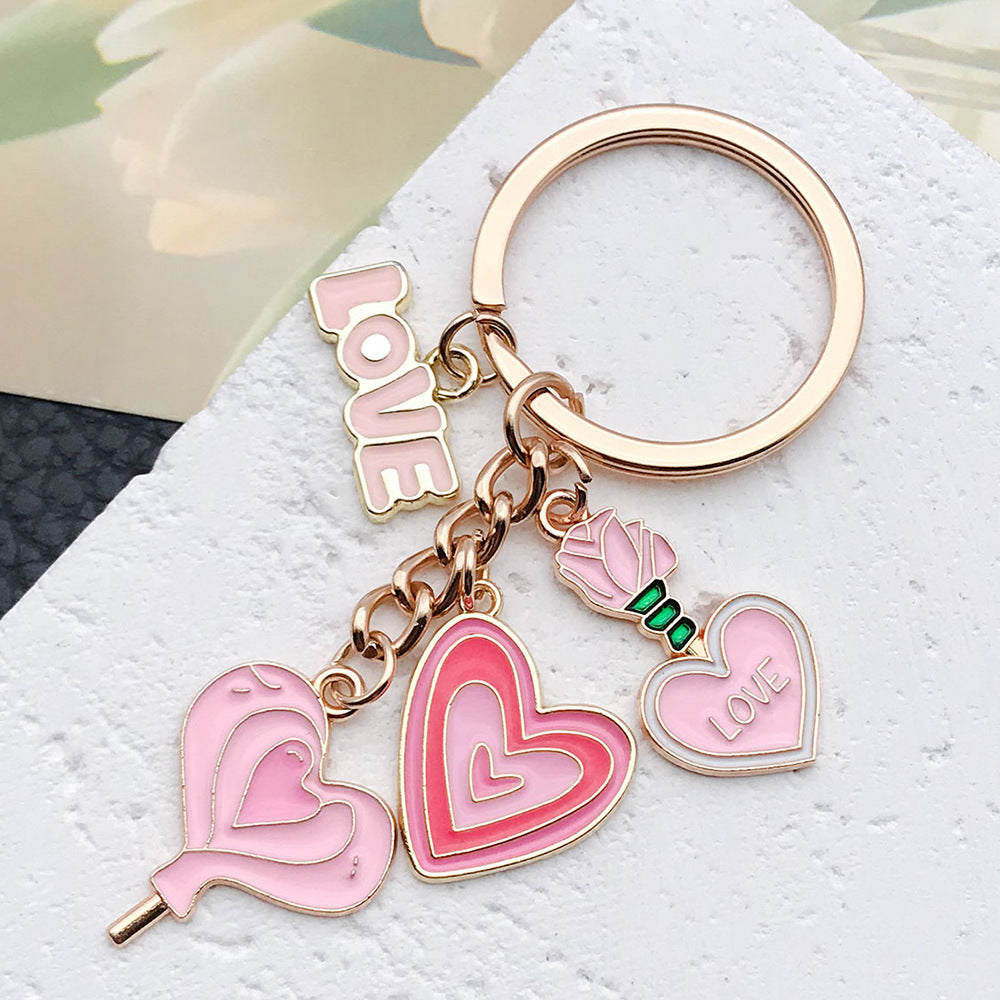 Wholesale Cute Pink Love Rose Potion Metal Keychain