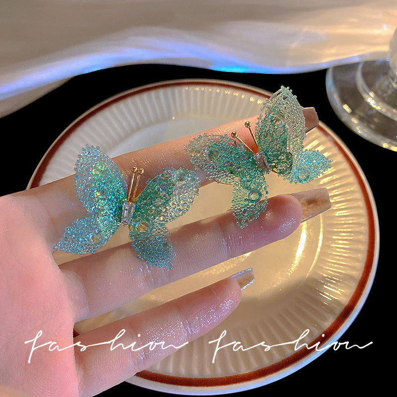 Pendientes de resina de mariposa al por mayor 925