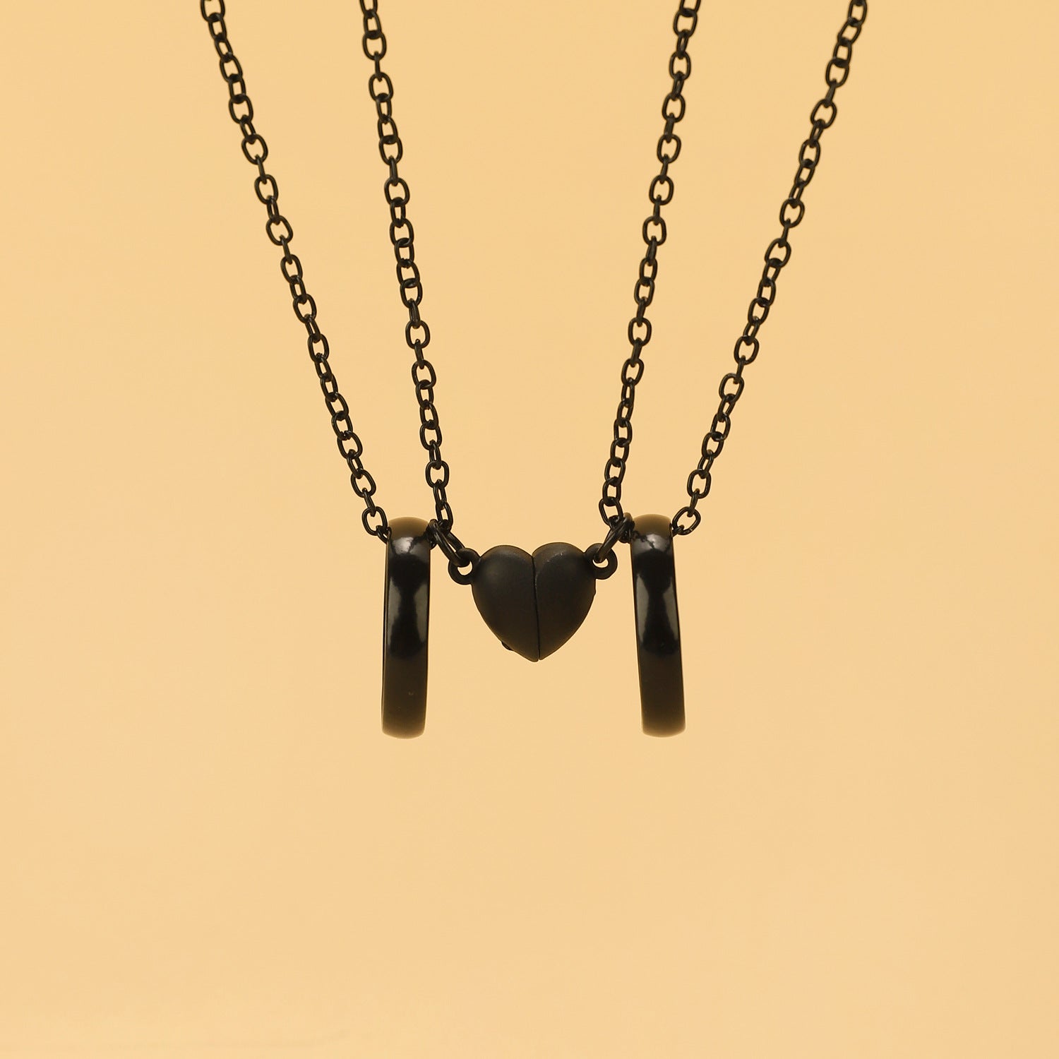 Wholesale hollow heart love magnetic unisex magnet couple necklace set