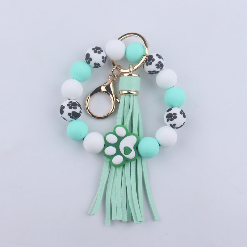 Wholesale Chic Silicone Bead Dog Paw Bracelet Keychain With Leather Tassel Fashion Gift For Resale