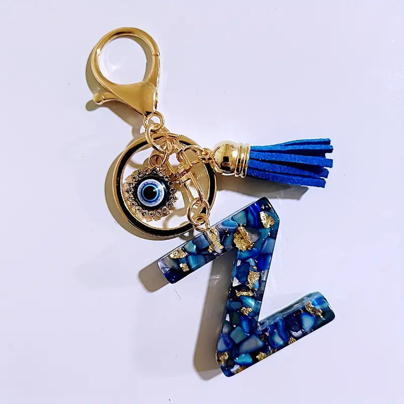 Wholesale Blue English letter Evil Eye tassel keychain