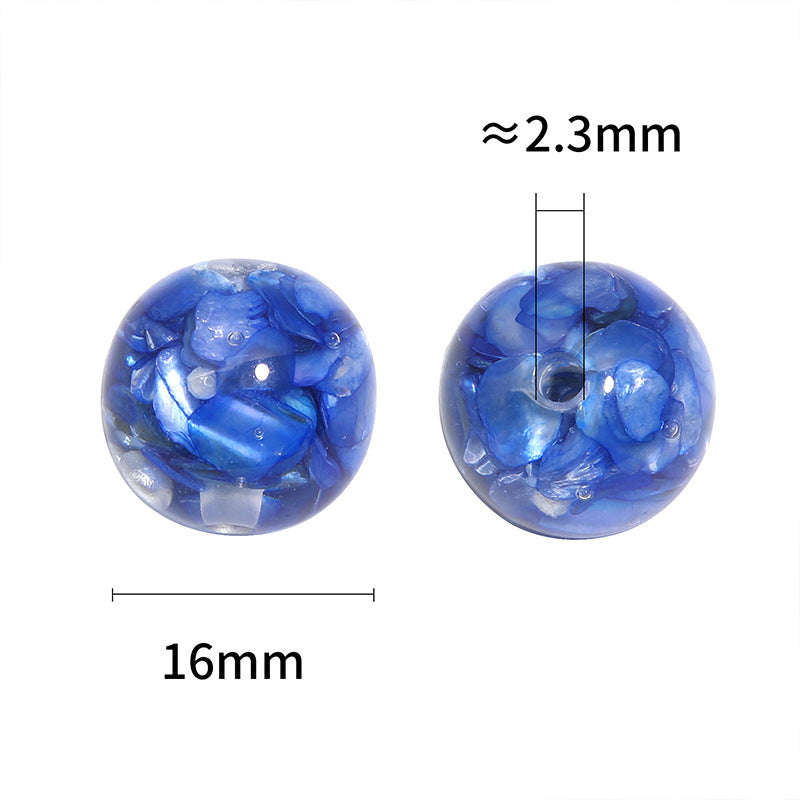 Wholesale  Random 100pcs/pack  Irregularly shaped     vibrant mother-of-pearl inlaid with translucent,  perforated beads.