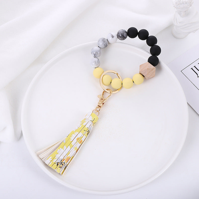 Wholesale Acrylic Beads Wooden Beads PU Tassel Bracelet Keychain