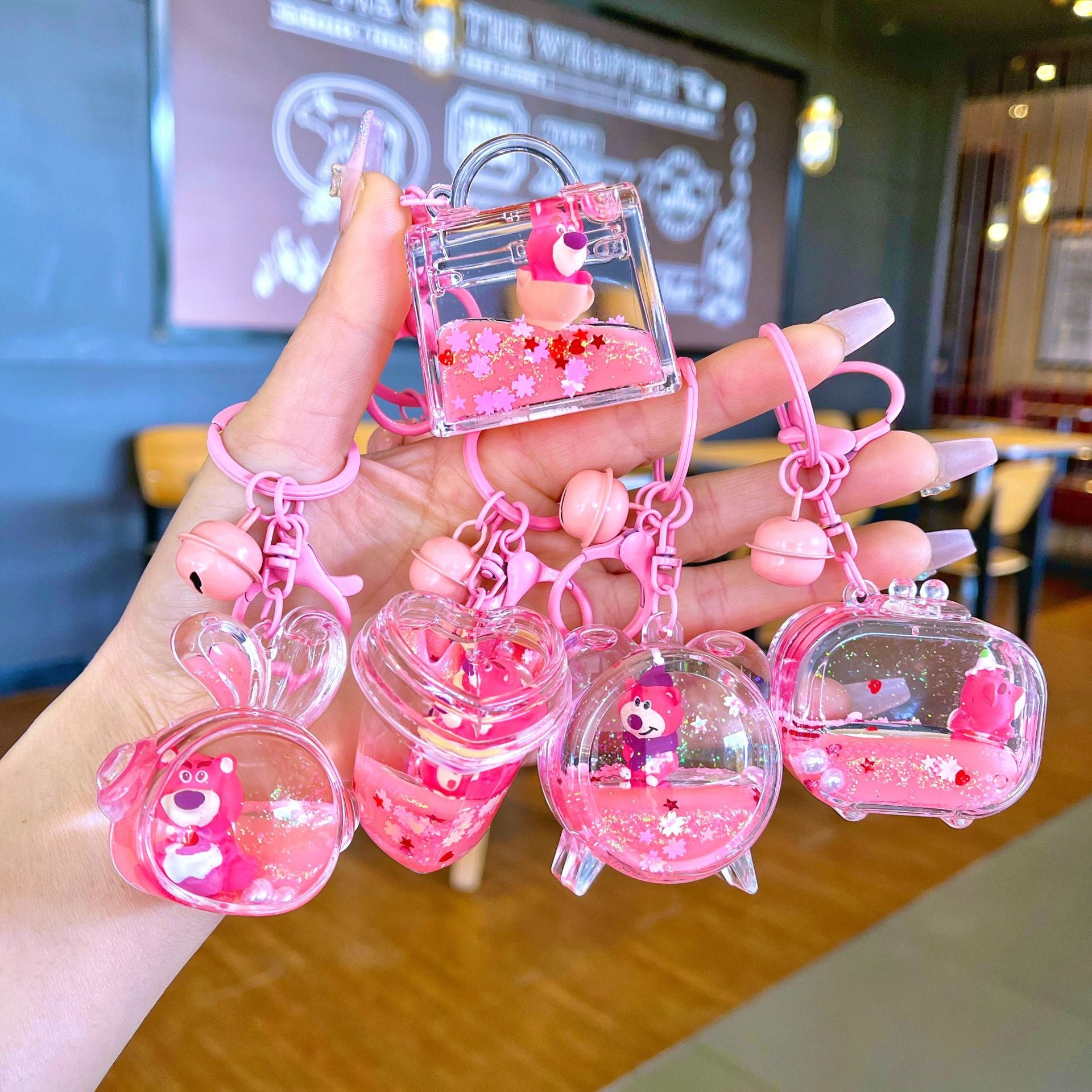 Wholesale Oil filled pink strawberry bear quicksand Keychains