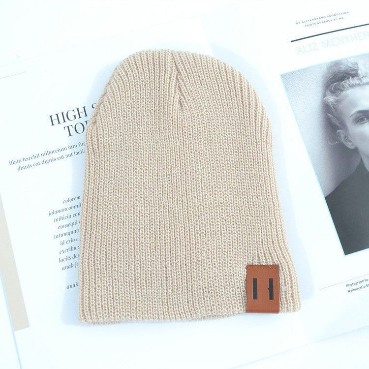 Wholesale Children's Leather Label Warm Ear Protection Knitted Wool Hat