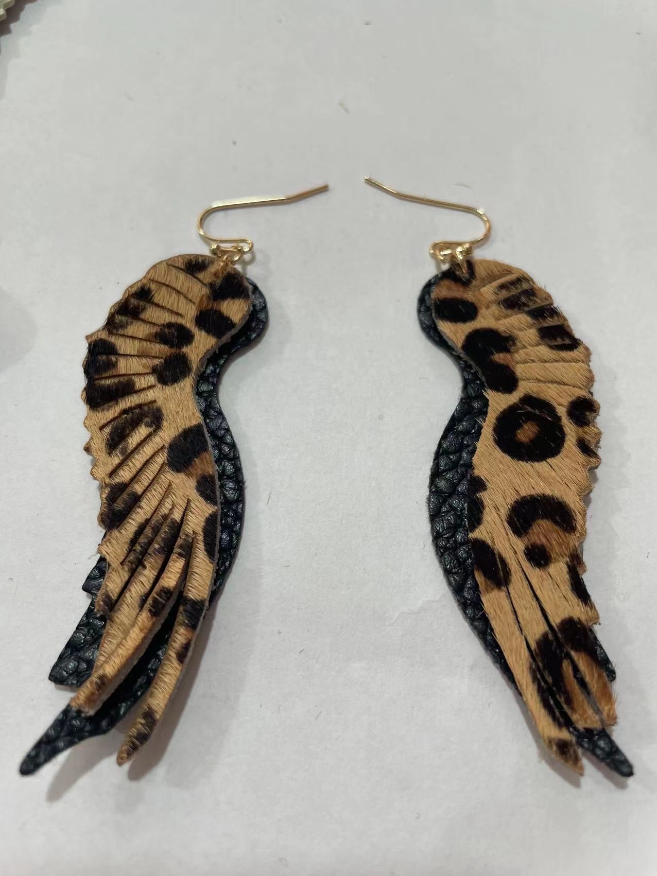 Pendientes de gorrión de plumas de cuero genuino genuinos al por mayor