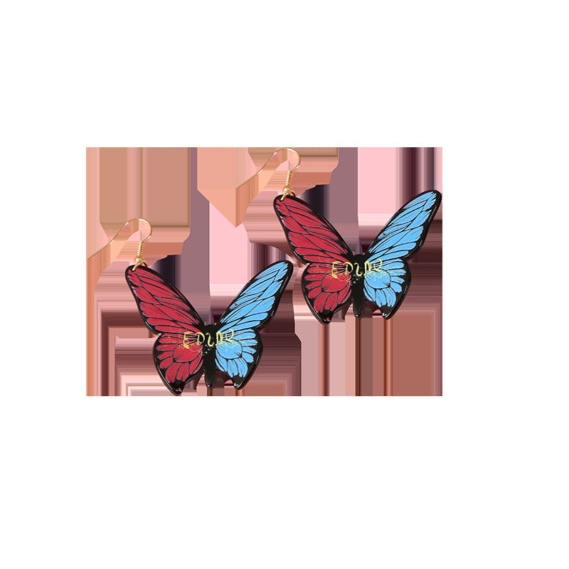 Pendientes estereoscópicos acrílicos de mariposa al por mayor pendientes coloridos