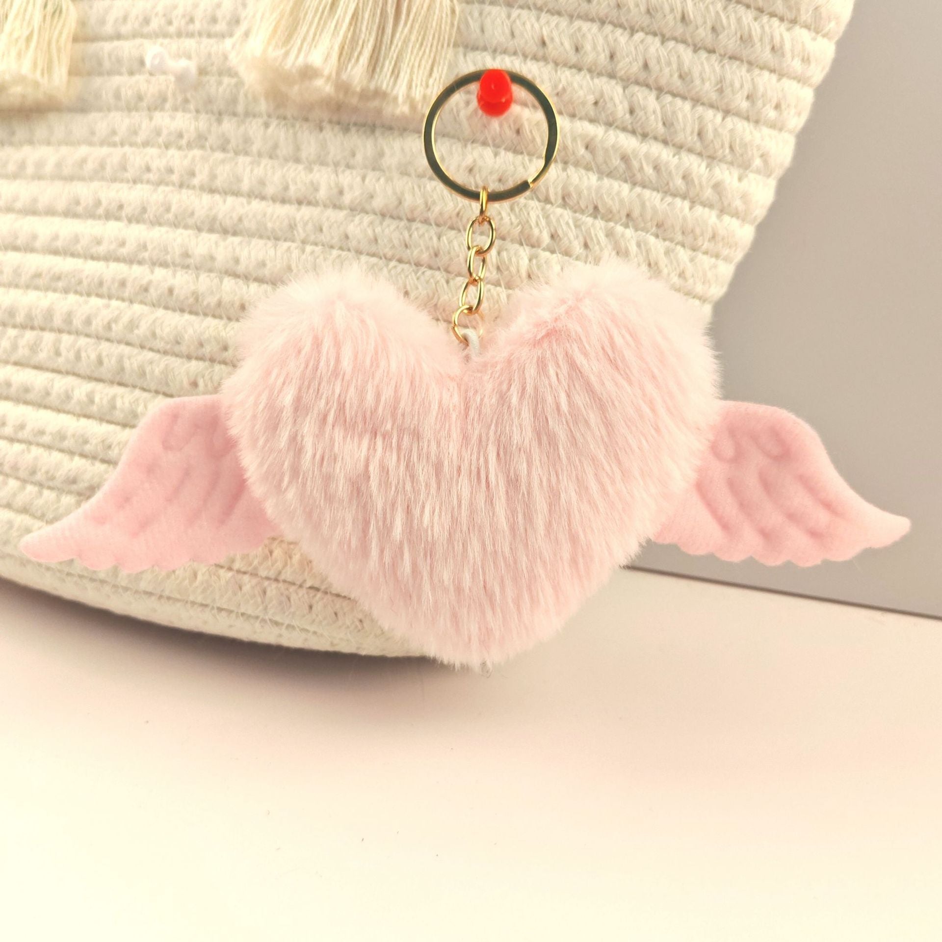 Wholesale Heart wings fur ball keychain