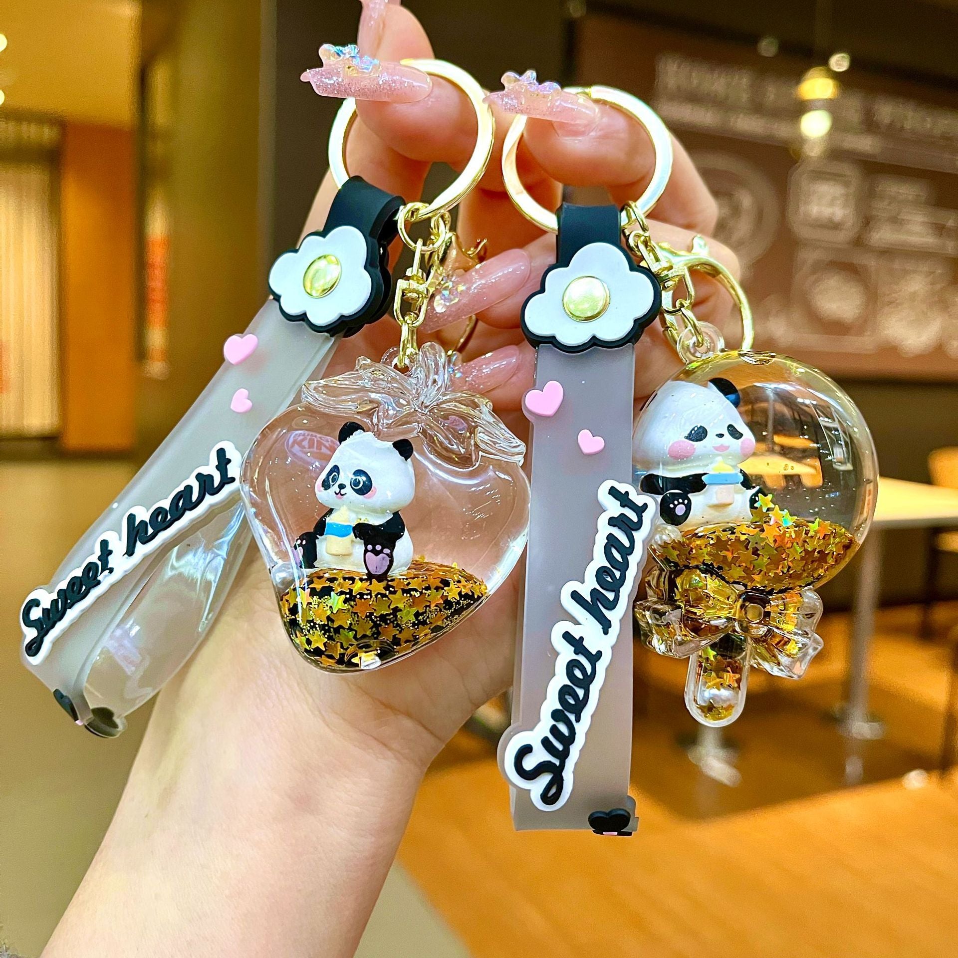 Wholesale Black gold floating cartoon cute panda Liquid Keychains