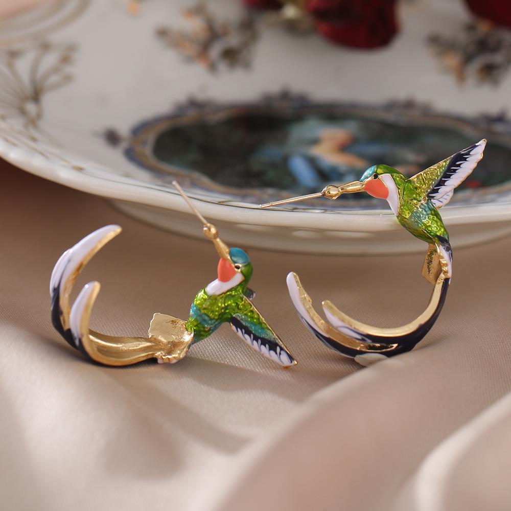 Wholesale Bird drop oil creative earrings