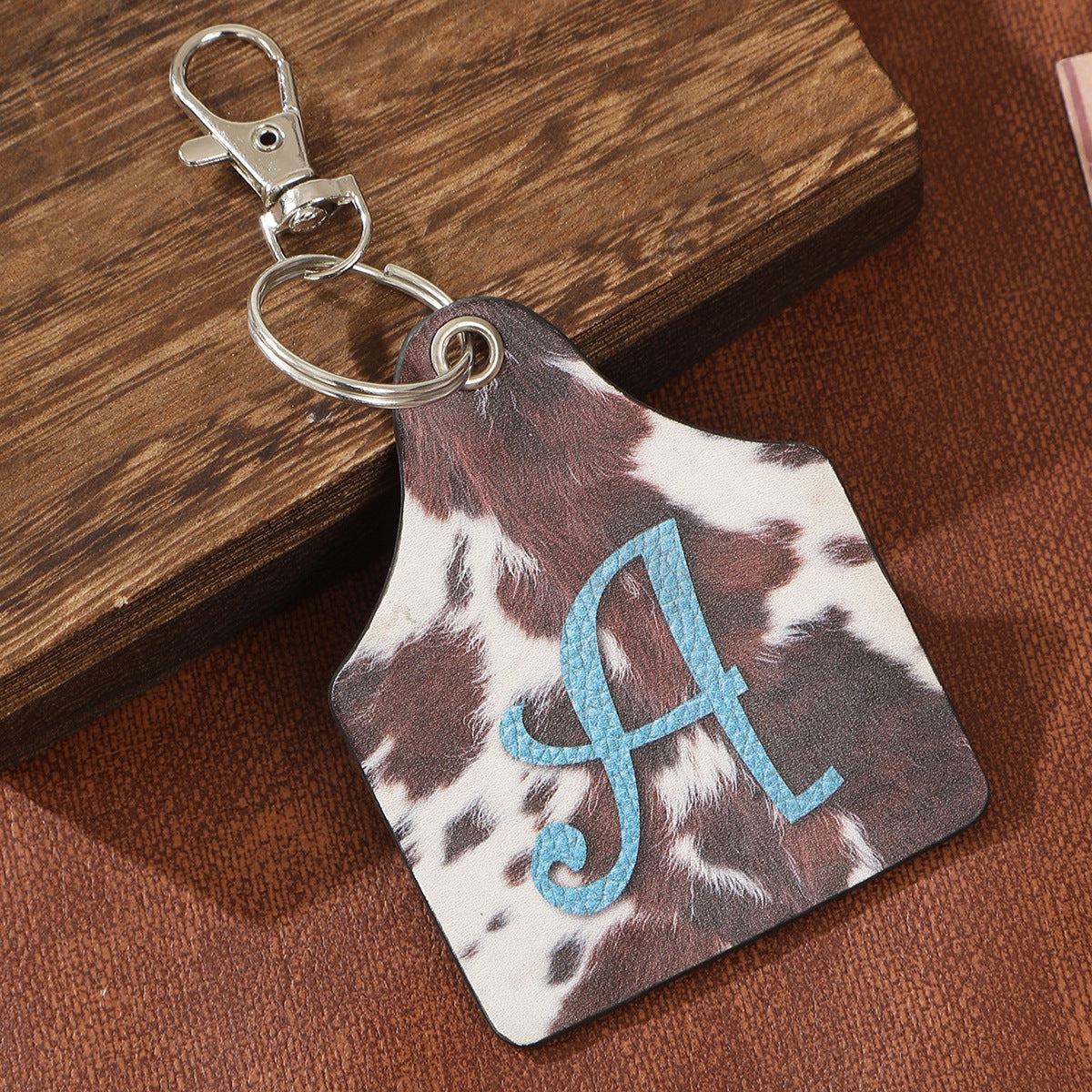 Wholesale Cow Print Animal Fur Letter A Printed Leather Keychain