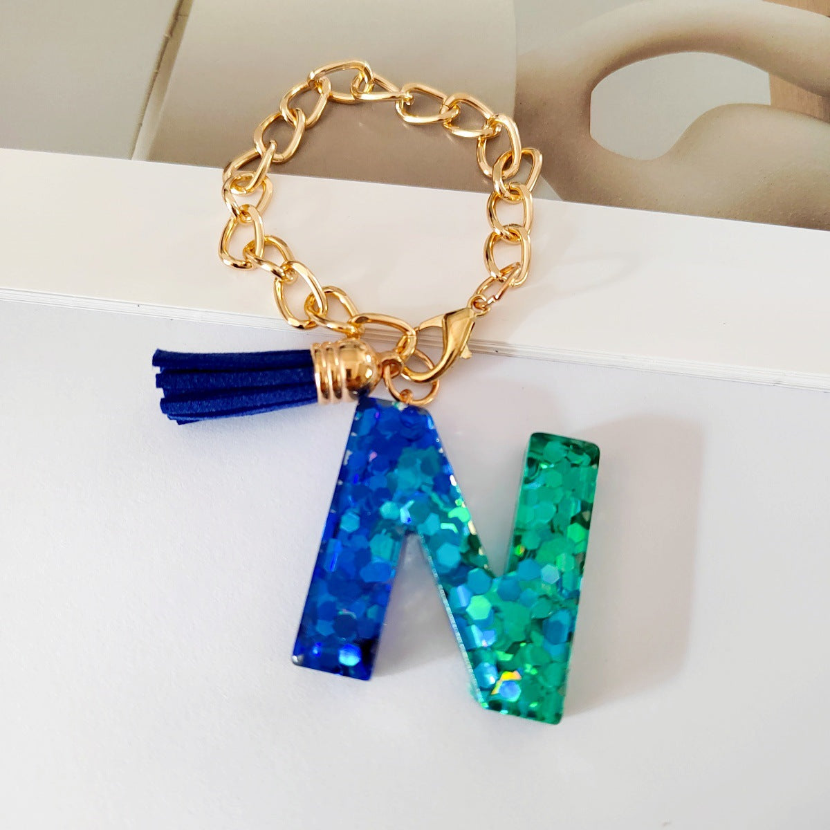 Wholesale Mixed color blue English letter keychain