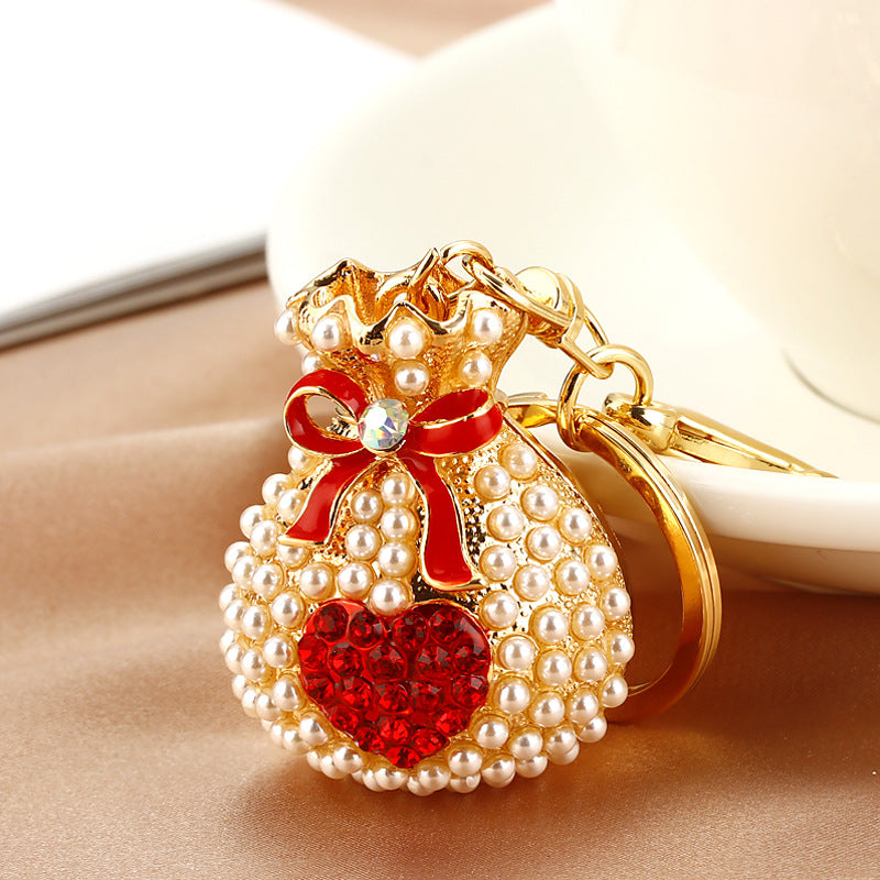 Wholesale Metal Pearl Heart Lucky Bag Keychain Cute Car Key Accessory Bag Charm For Women Gift