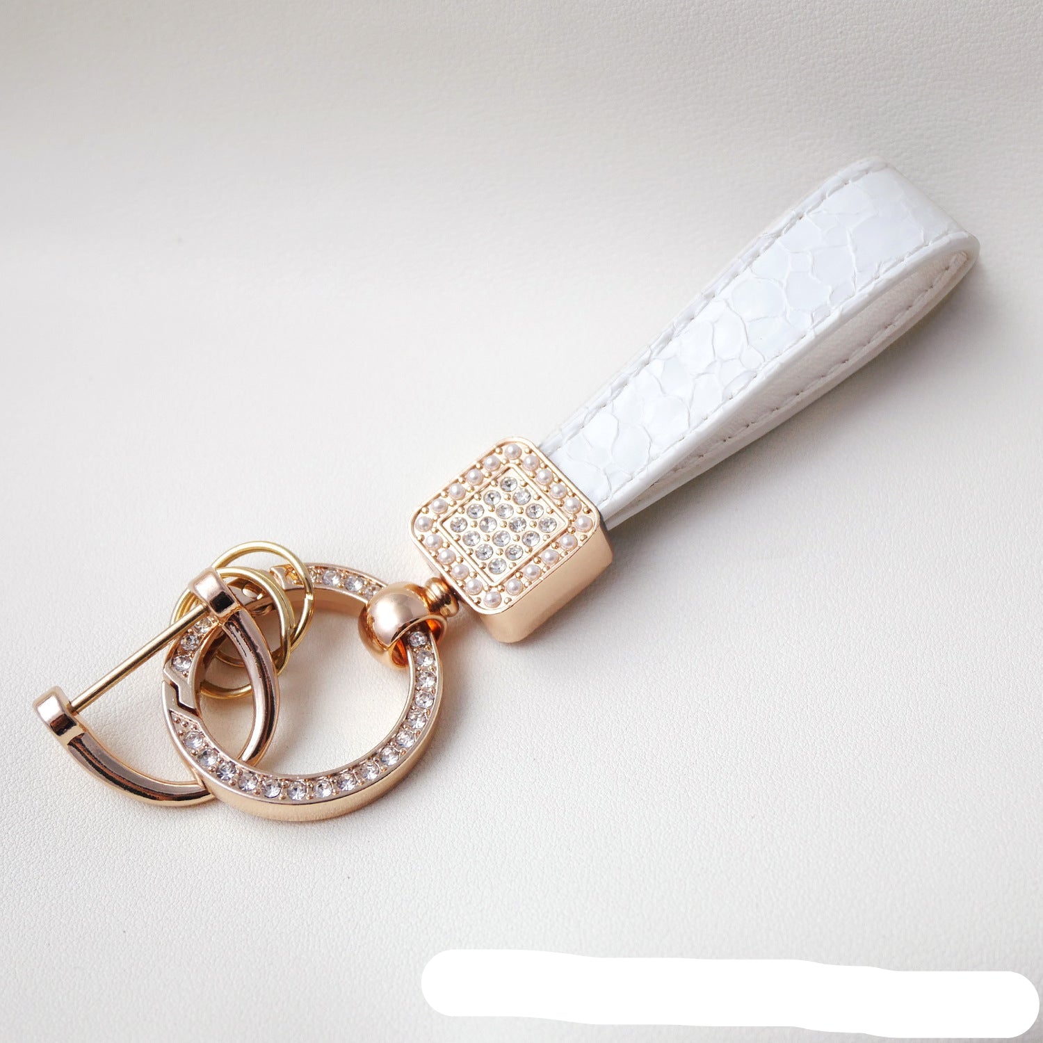 Wholesale Fashionable textured diamond spring ring keychain