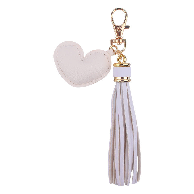 Llavero de borla de cuero de corazón al por mayor