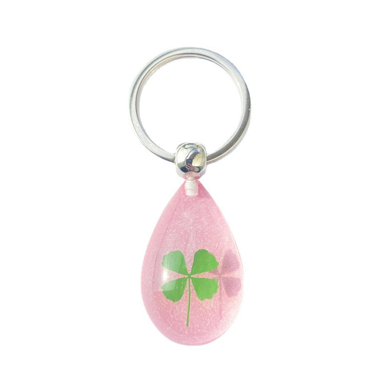 Wholesale 12pcs Four-leaf Clover Luminous Keychain