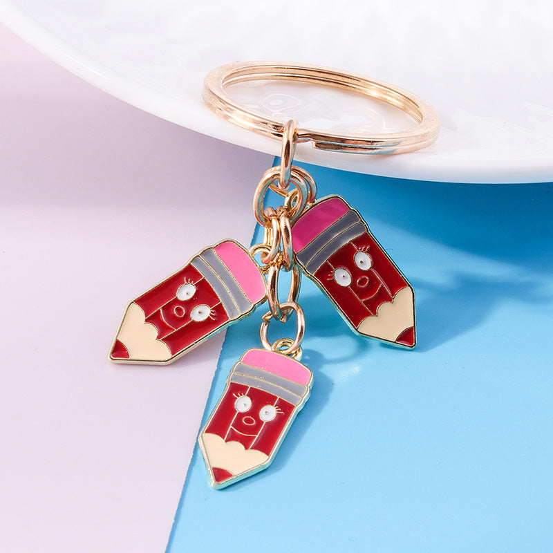 Wholesale Cartoon Crayon Pencil Zinc Alloy Keychain