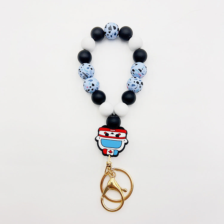 Wholesale Silicone Pumpkin Cow Ghost Dog Paw Wooden Bead Bracelet Keychain