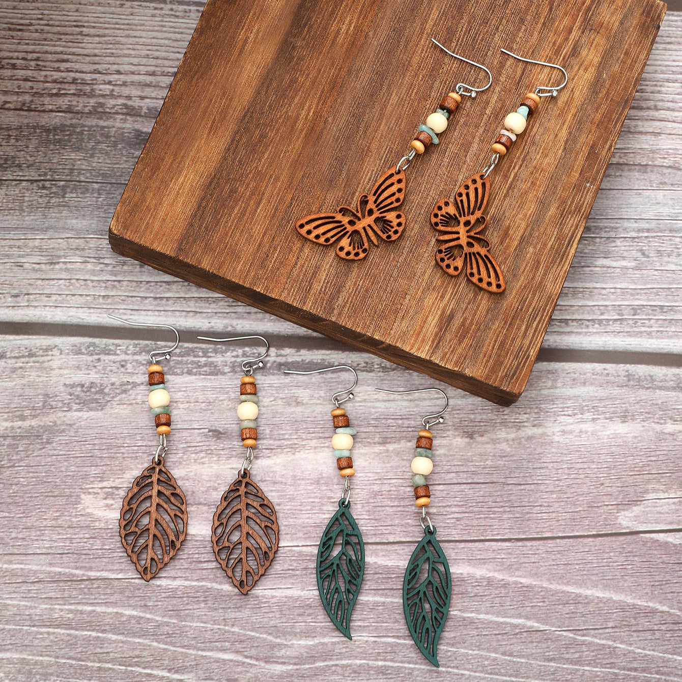 Wholesale Bohemian Butterfly Leaves Skull Hollow Wooden Earrings
