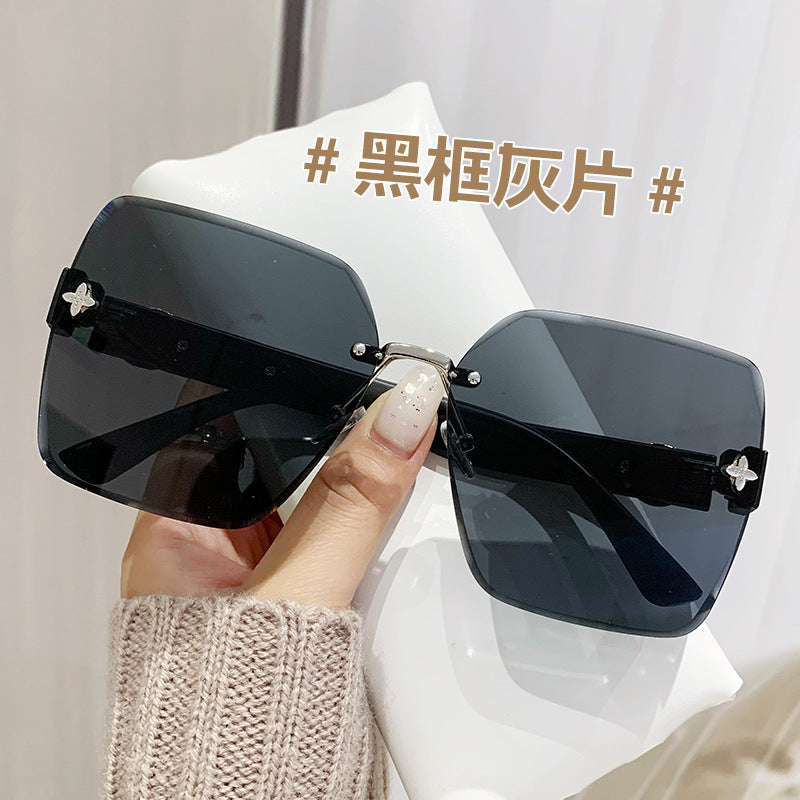 Wholesale Frameless Trimmed Trendy Sunglasses