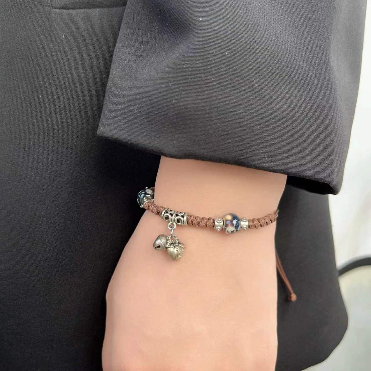 Wholesale Vintage Ceramic Bells Safety Lock Handwoven Rope Bracelets