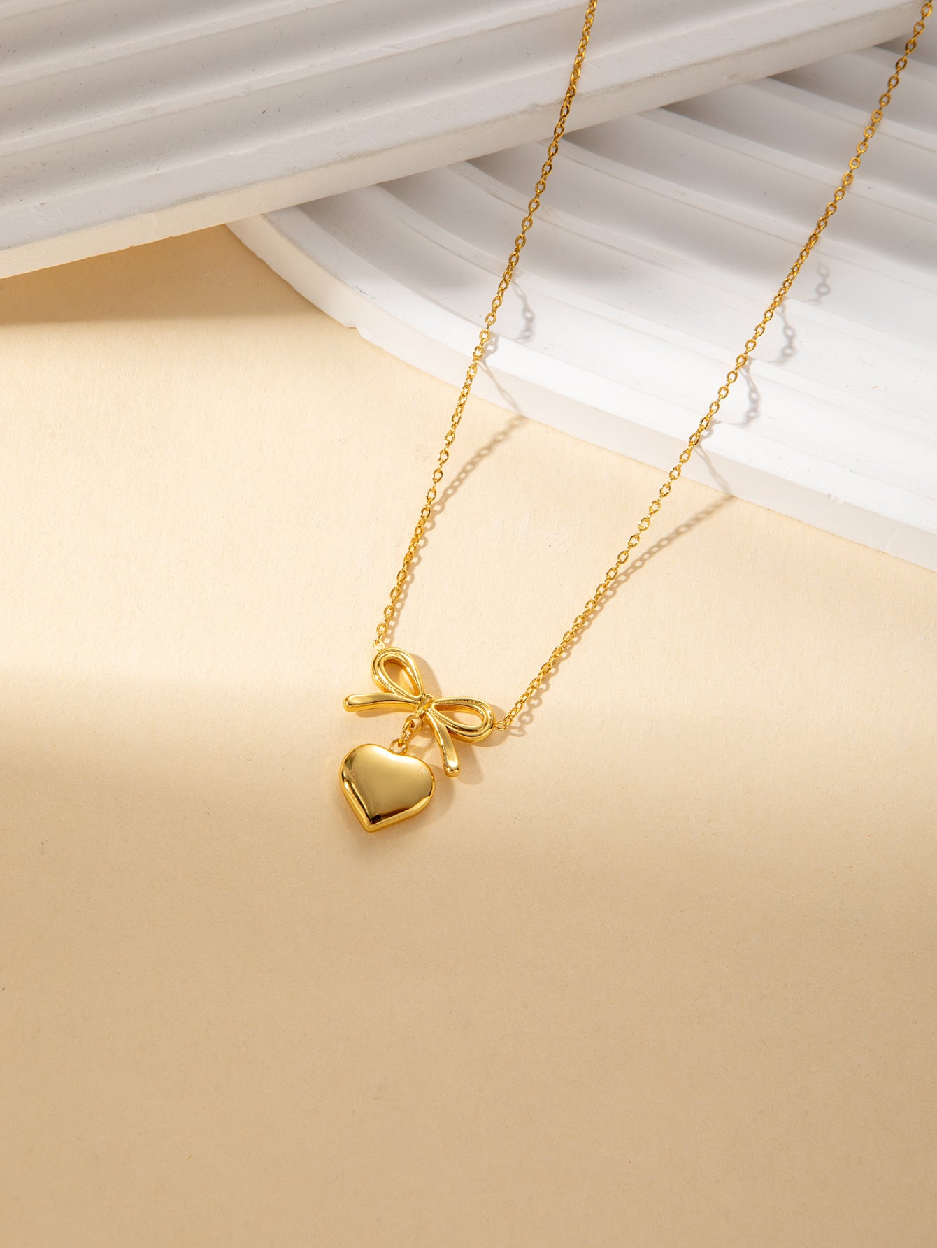 Wholesale titanium steel necklace gold luxury creative bow necklace