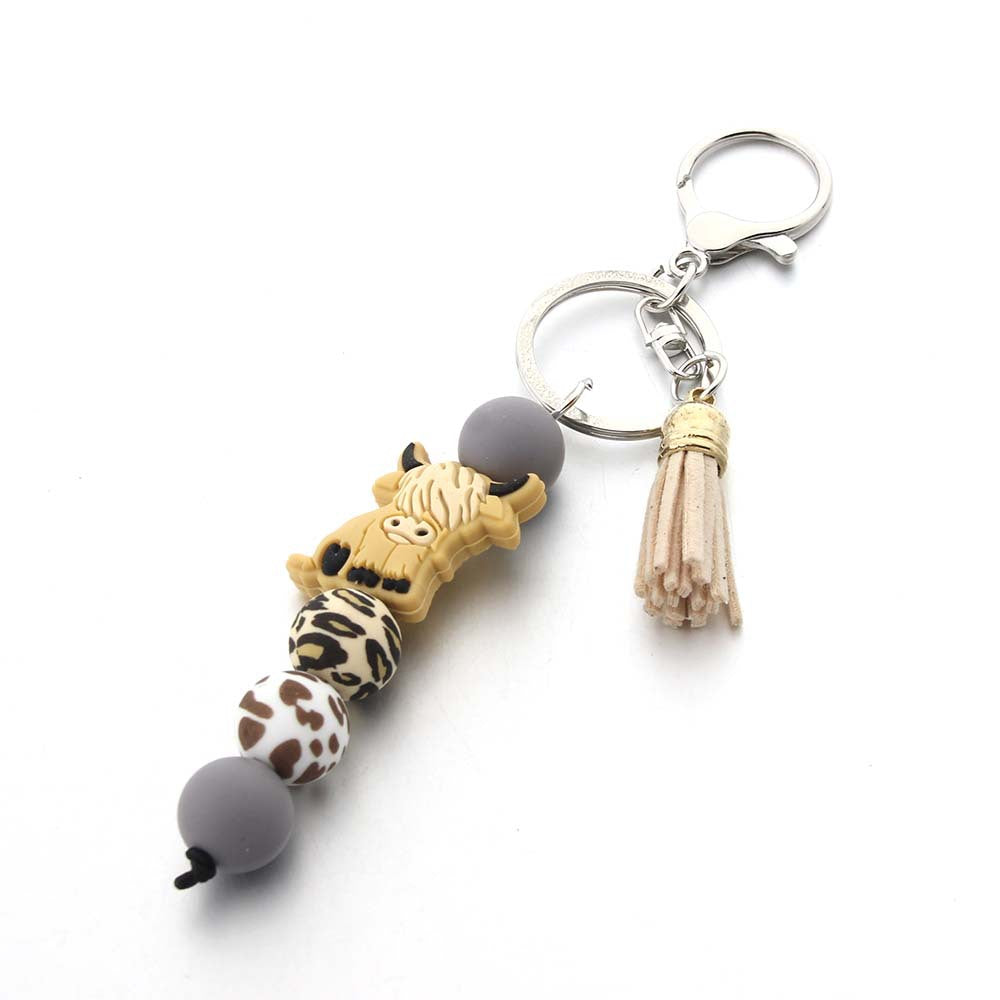 Wholesale Cartoon Cow Tooth Silicone Bead Keychain