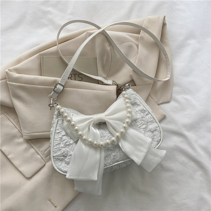 Wholesale Retro Bowknot Fashion Pearl Underarm Shoulder Crossbody Bag