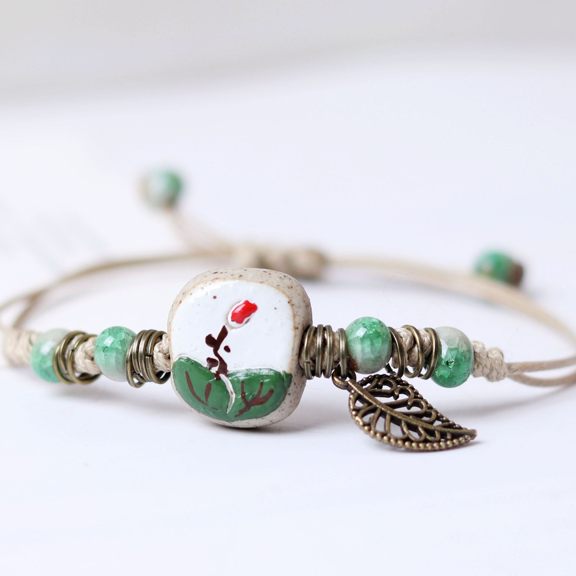 Brazalete de hoja de flores de polo de color de color arcilla al por mayor