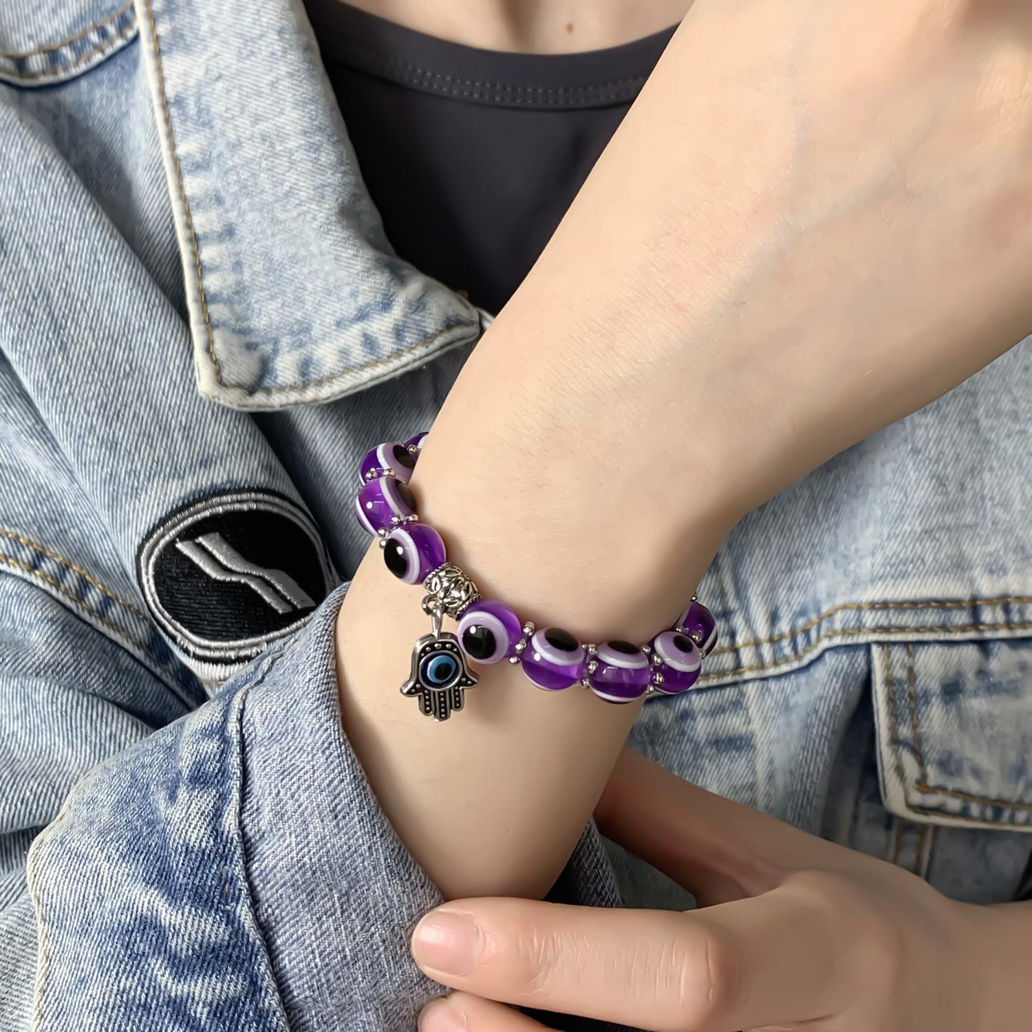 Wholesale alloy palm hollow blue eyes beaded pendant elastic bracelet Charms