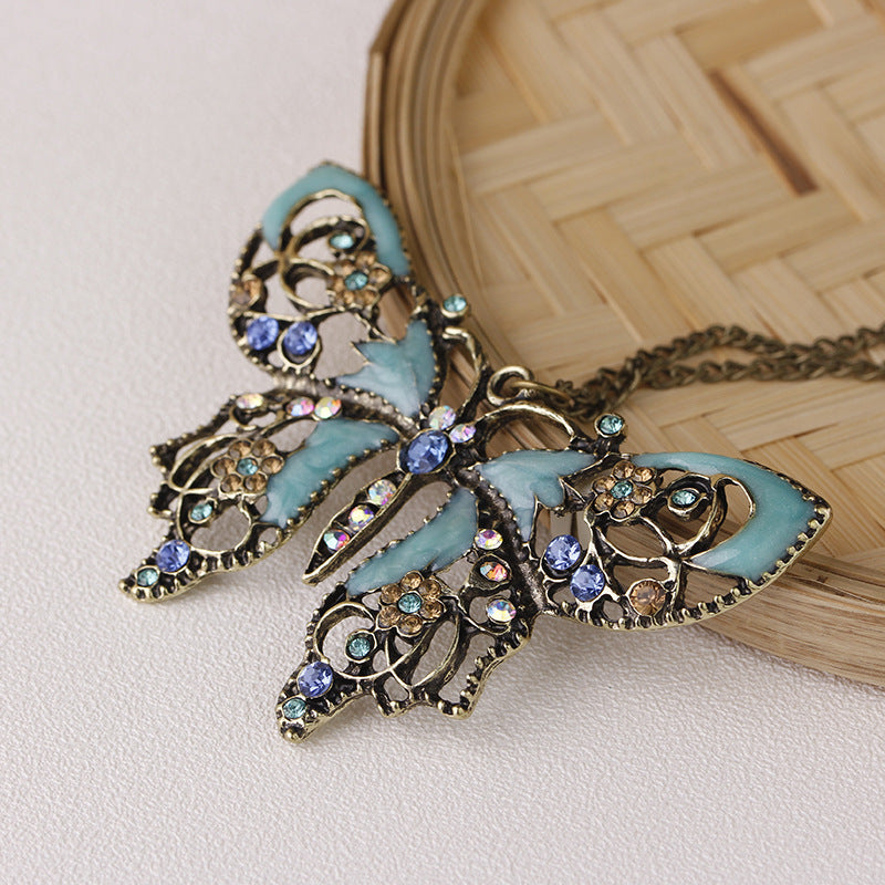 Wholesale Vintage Hollow Oil Dripping Butterfly Alloy Sweater Chain