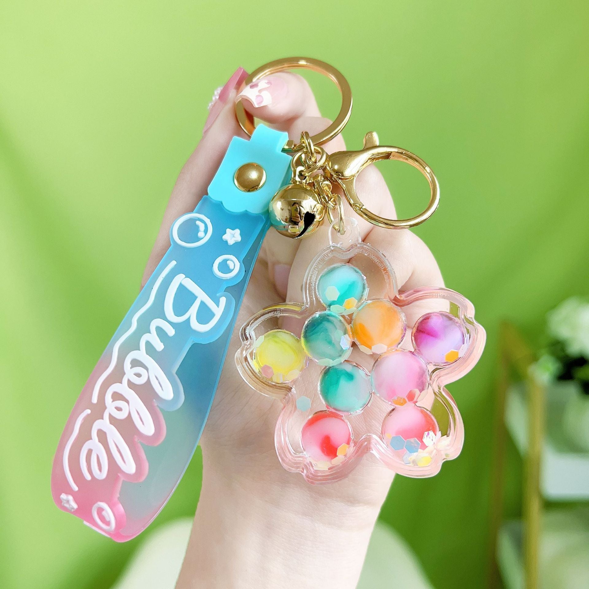 Botellas de burbujas de burbujas de luz nocturna al por mayor llavero acrílico