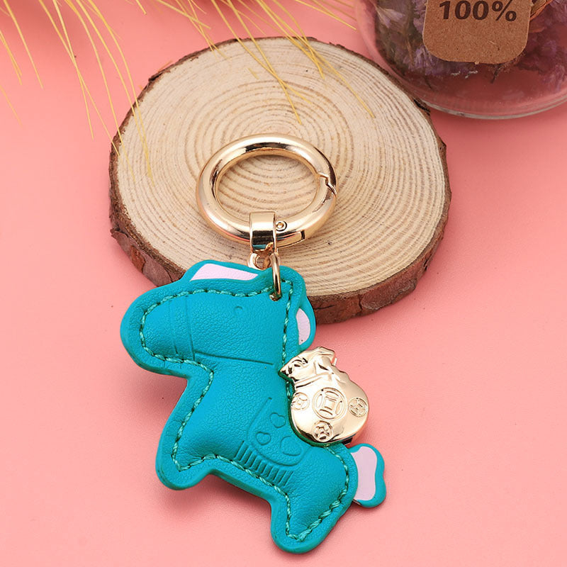Wholesale Immediately get rich handmade cow leather car keychain pendant