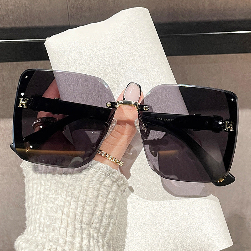 Wholesale Women's rimless sunglasses Chanel style large frame sunglasses