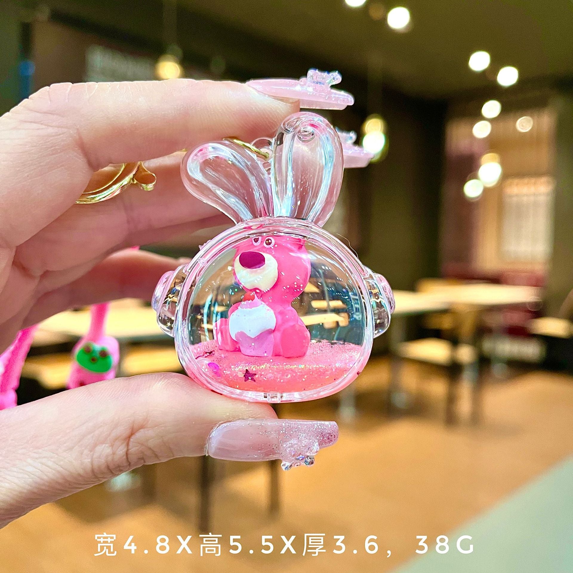 Wholesale Oil filled pink strawberry bear quicksand Keychains