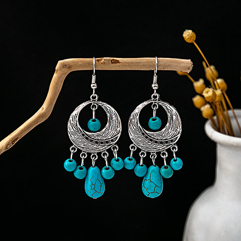 Wholesale Hollow Circular Flower Tassel Alloy Earrings