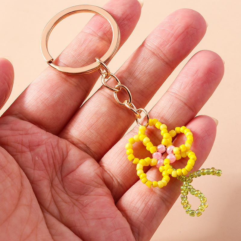 Wholesale Rice Pearl Flower Pendant Keychain